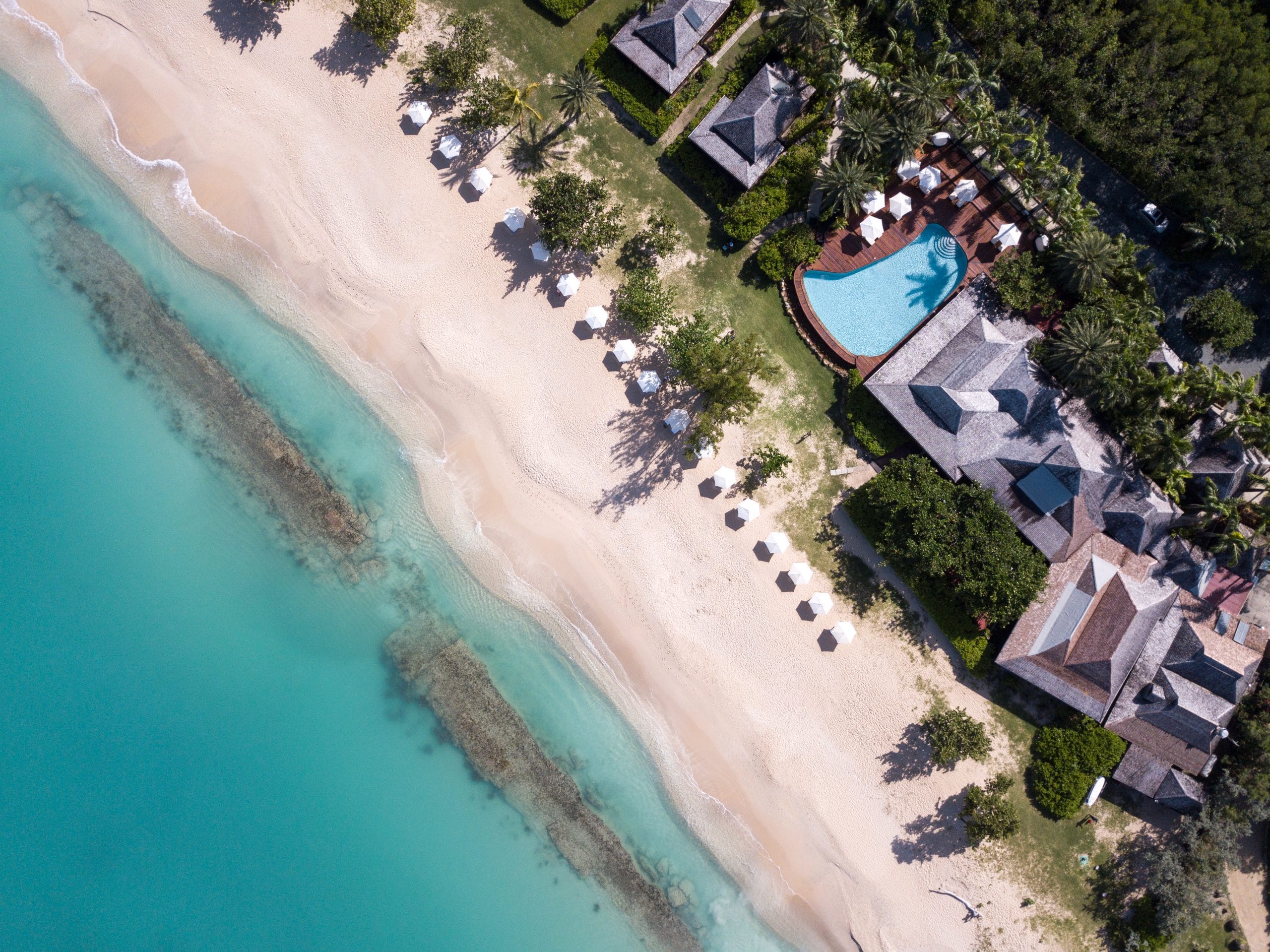 beach-and-reef-aerial-hermitage-bay